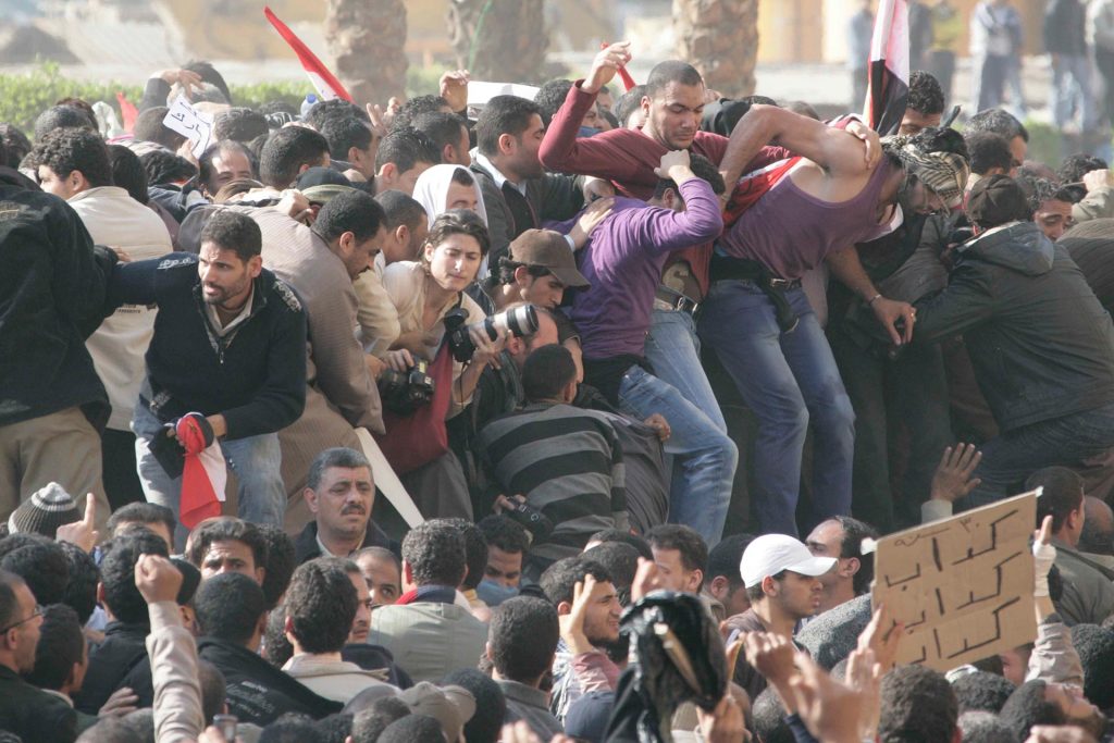 Tara Todras-Whitehill getting trampled by protesters in Tahrir Square during the Egyptian revolution.