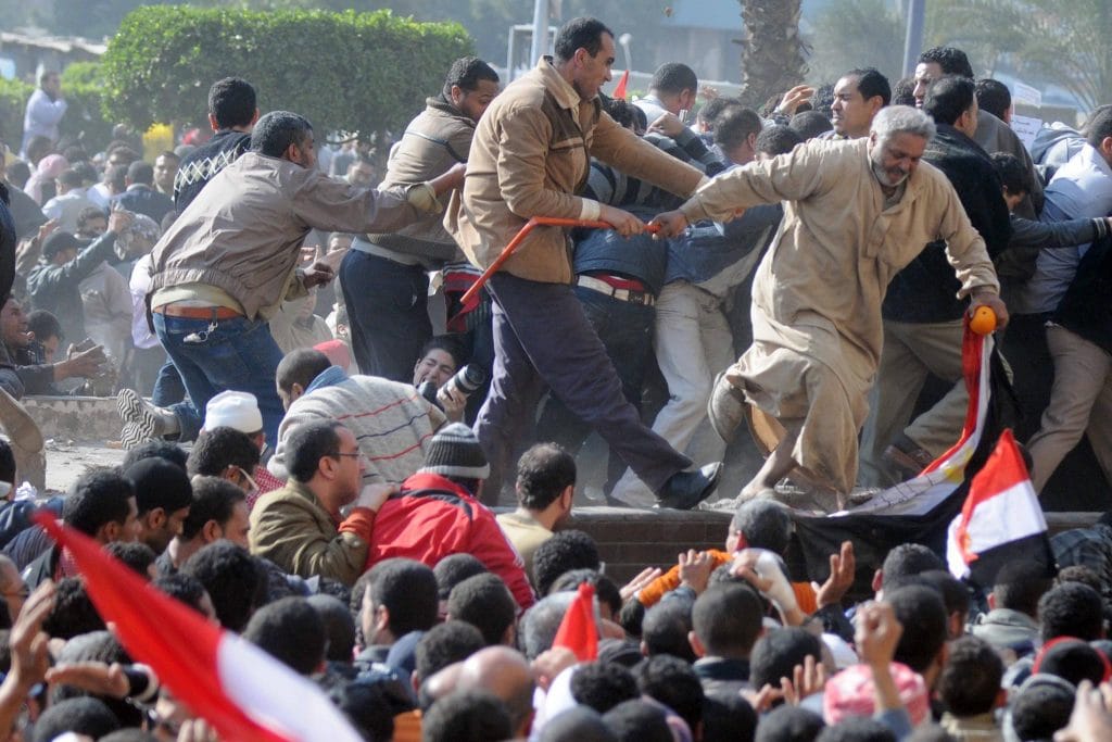 Tara Todras-Whitehill getting trampled by protesters in Tahrir square.